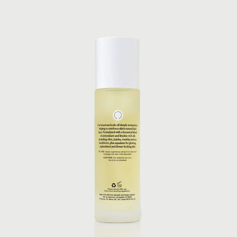 NATR-10115-The-Glow-Getter-Body-Oil-bonebkgd-Back-CapOn.jpg